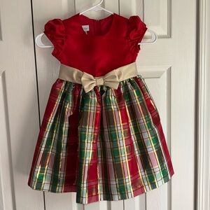 dress with stretch velvet and plaid skirt. with beautiful silver bow on front